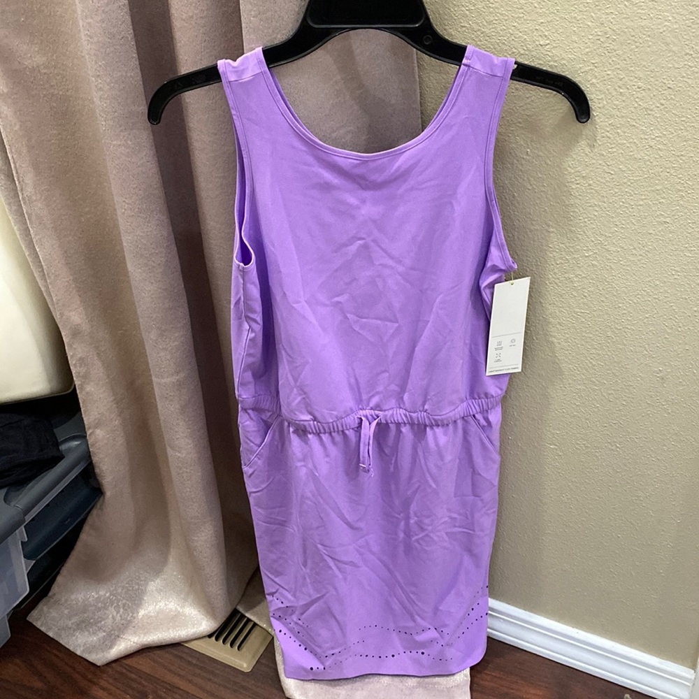 New with tags. Target brand All in Motion girls dress. Girls size L or 10-12.